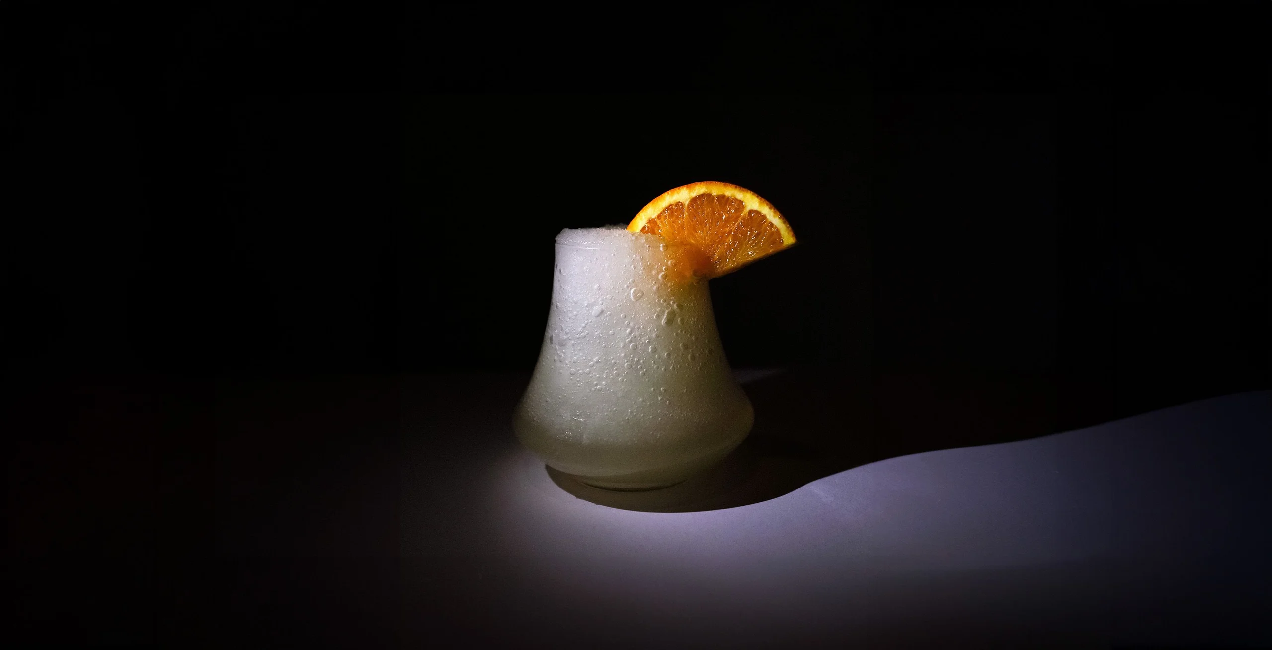 Arancino cocktail op de bar